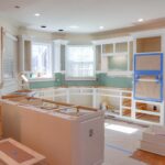 Kitchen with no cabinets is process of a remodel