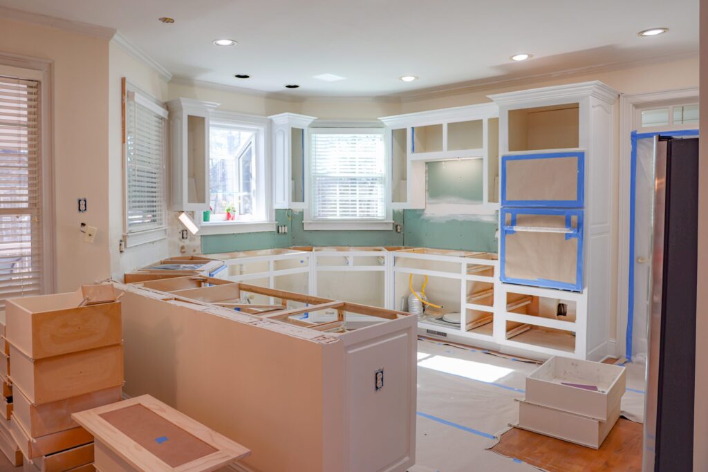 Kitchen with no cabinets is process of cabinet refacing