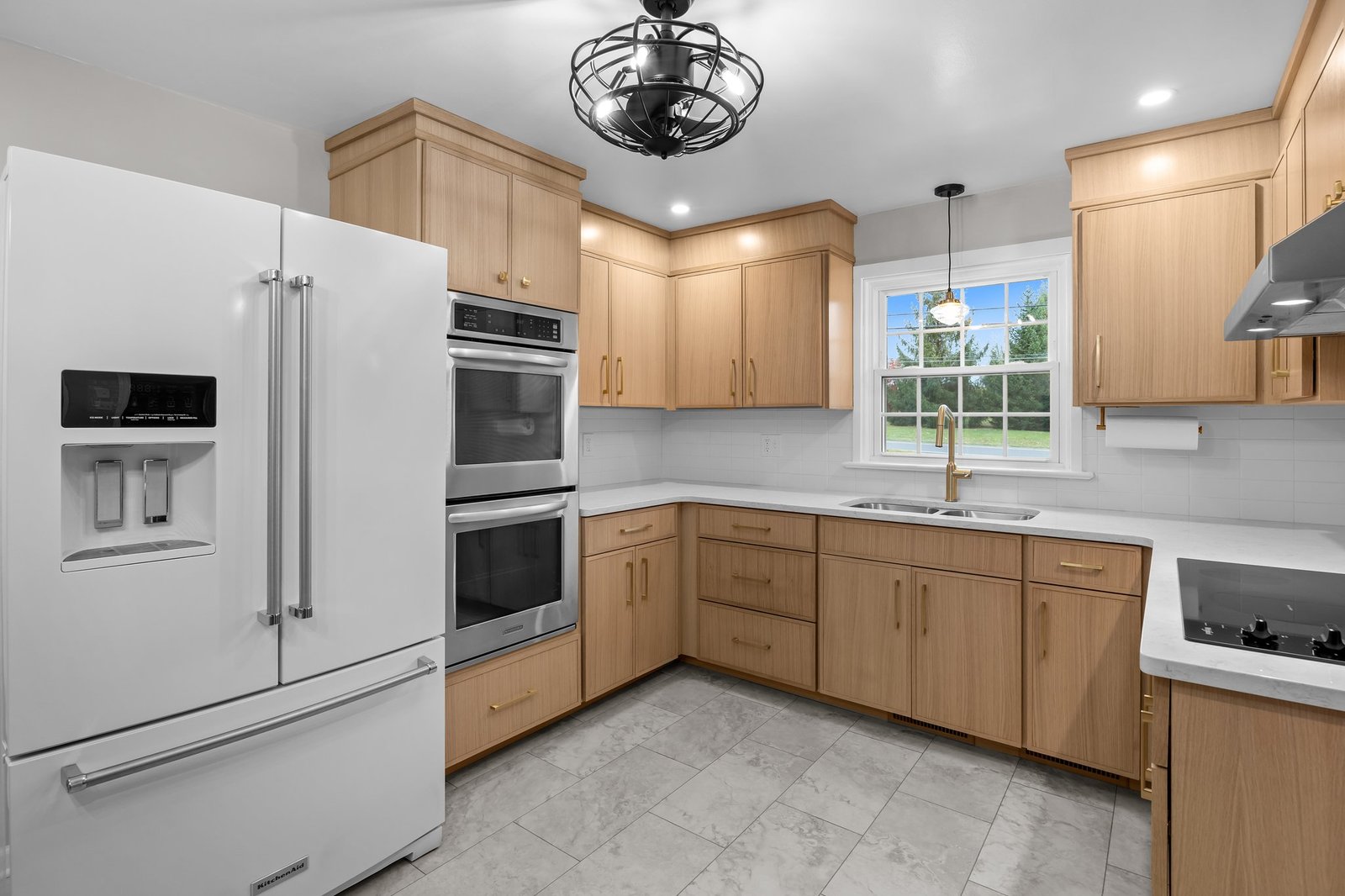 White oak cabinet refacing with white fridge