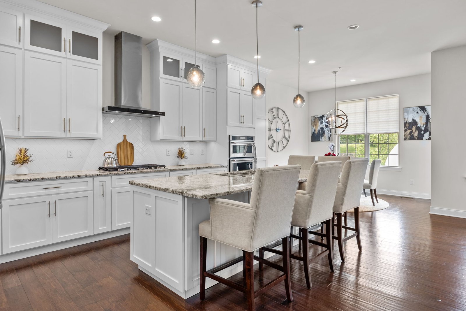 White shaker cabinet refacing with custom cabinetry and pendant lighting in Dresher, Montgomery County, PA